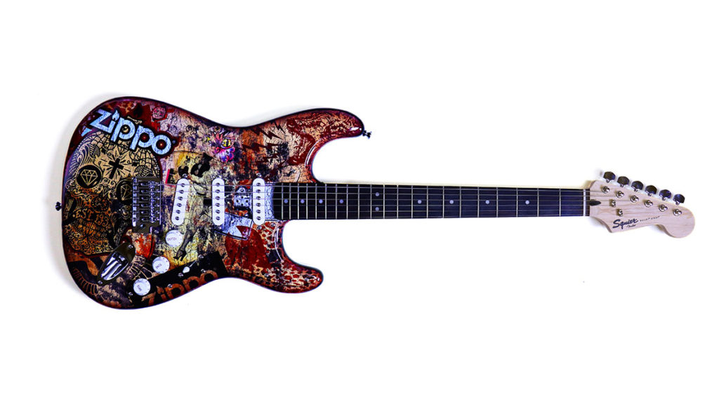 Wir verlosen eine limitierte Fender-Gitarre im Zippo-Design.
