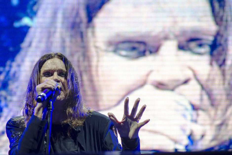 Musician Ozzy Osbourne, lead singer of British band Black Sabbath during concert of their world tour, 'The Reunion Tour', in 