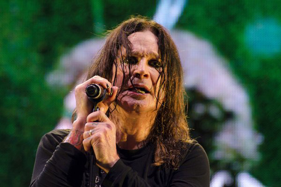 Musician Ozzy Osbourne, lead singer of British band Black Sabbath during concert of their world tour, 'The Reunion Tour', in 