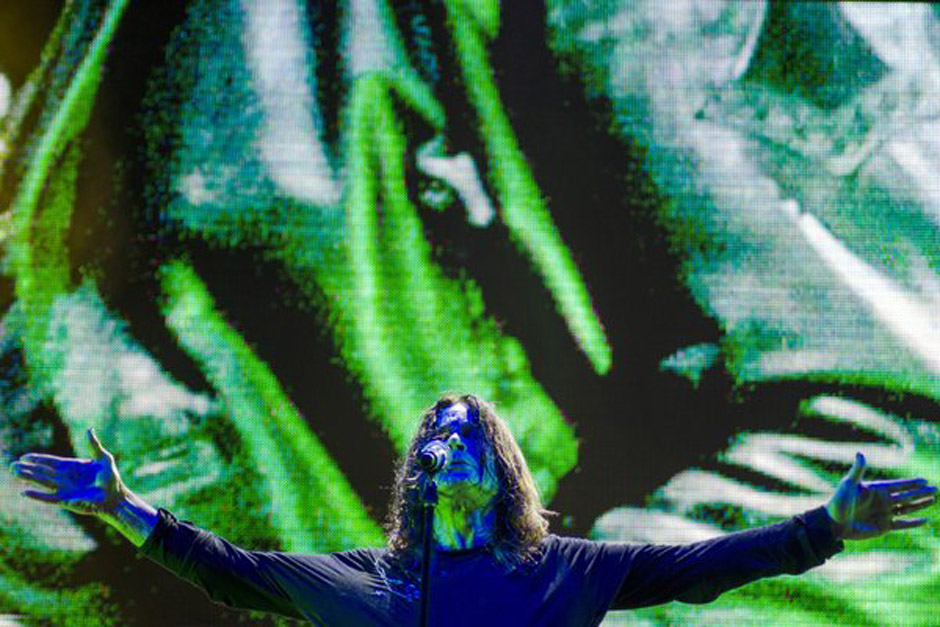 Musician Ozzy Osbourne, lead singer of British band Black Sabbath during concert of their world tour, 'The Reunion Tour', in 