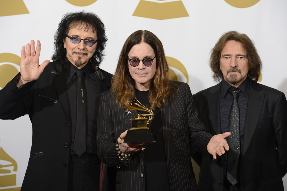 Image #: 26816101    .(L-R) Recording artists Tony Iommi, Ozzy Osbourne and Geezer Butler of Black Sabbath hold their Gram...