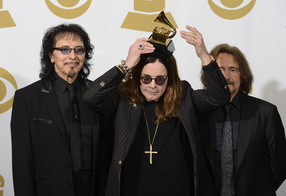Image #: 26816185    (L-R) Recording artists Tony Iommi, Ozzy Osbourne and Geezer Butler of Black Sabbath hold their Gramm...