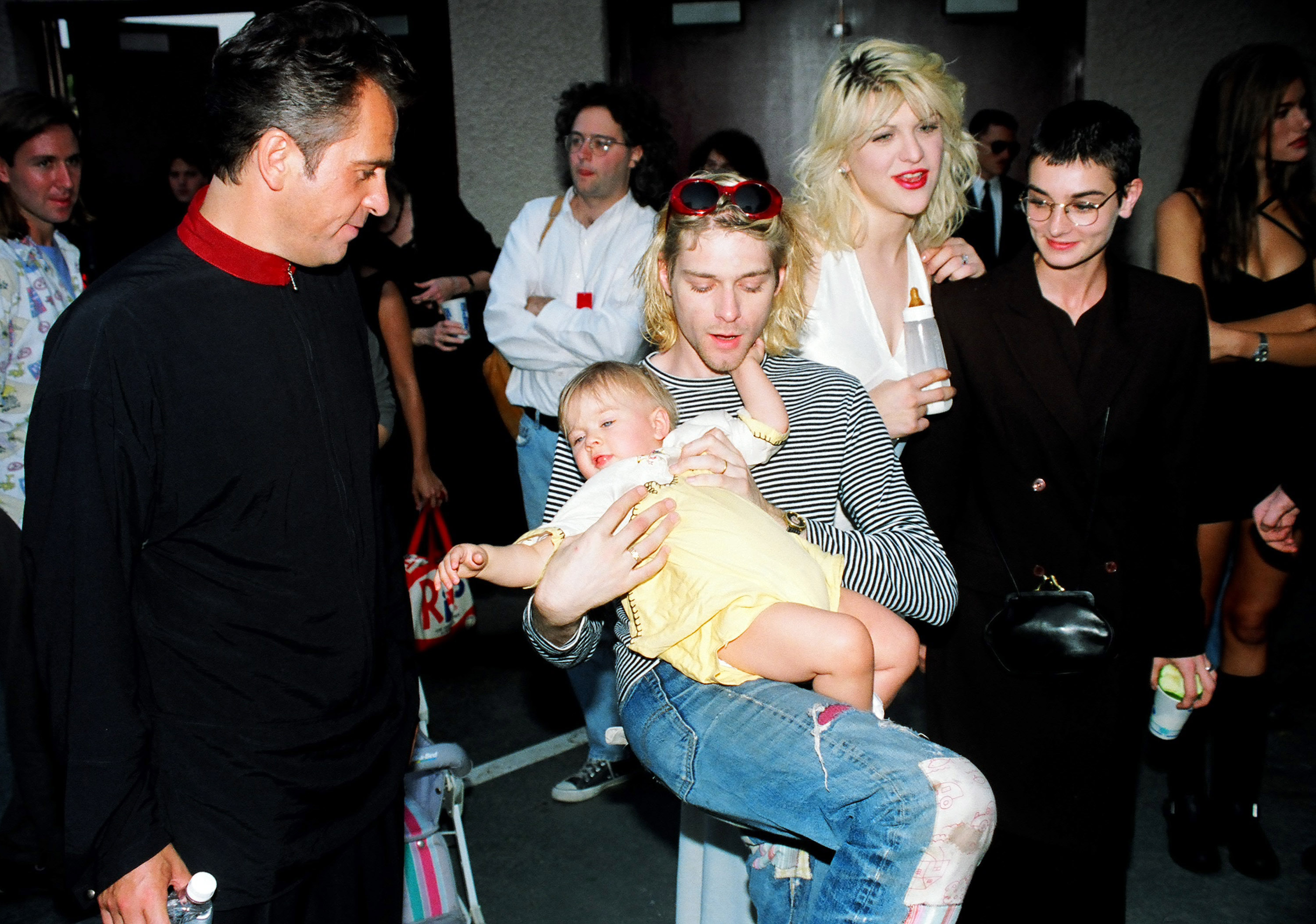 Peter Gabriel, Kurt Cobain of Nirvana with wife Courtney Love and daughter Frances Bean Cobain, and Sinead O'Connor (Photo by