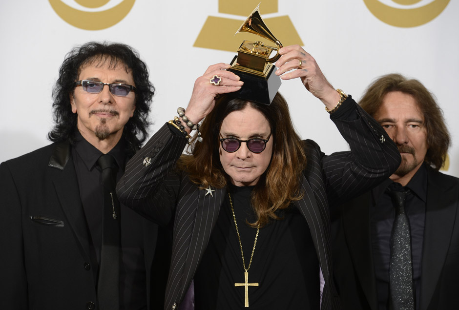 Image #: 26816131    .(L-R) Recording artists Tony Iommi, Ozzy Osbourne and Geezer Butler of Black Sabbath hold their Grammy 