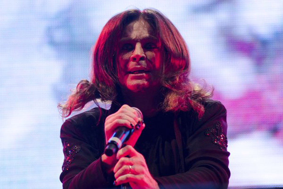 Musician Ozzy Osbourne, lead singer of British band Black Sabbath during concert of their world tour, 'The Reunion Tour', in 