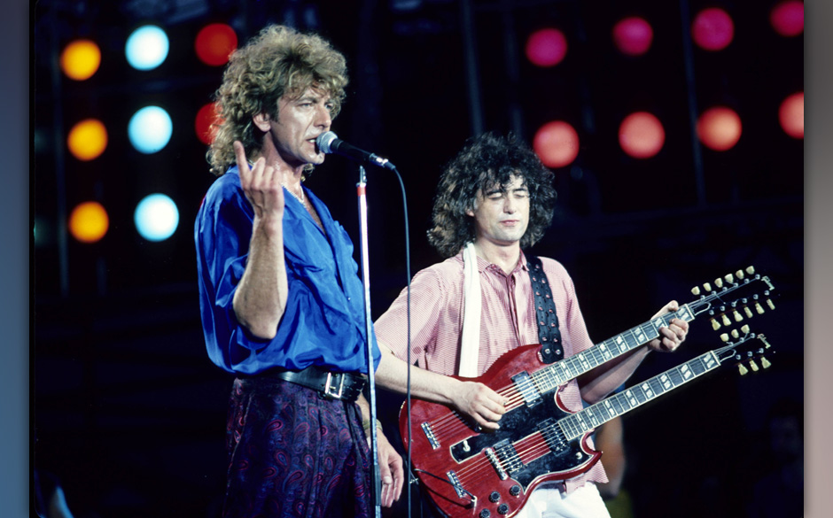 UNITED STATES - JULY 13:  Photo of Jimmy PAGE and LED ZEPPELIN and Robert PLANT and LIVE AID; L-R: Robert Plant, Jimmy Page p
