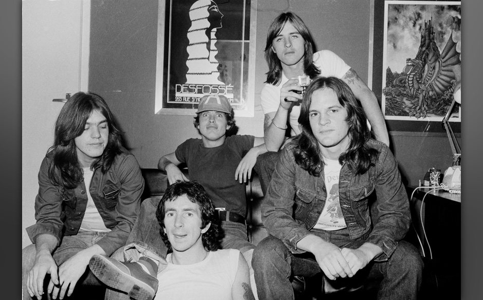 AC/DC group portrait, London, July 1976, L-R Malcolm Young, Bon Scott, Angus Young, Phil Rudd, Mark Evans. (Photo by Michael 