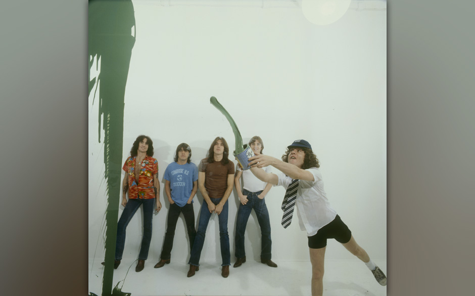 LONDON, UNITED KINGDOM - AUGUST 01: (left to right) Bon Scott, Malcolm Young, Cliff Williams, Phil Rudd and Angus Young of Au