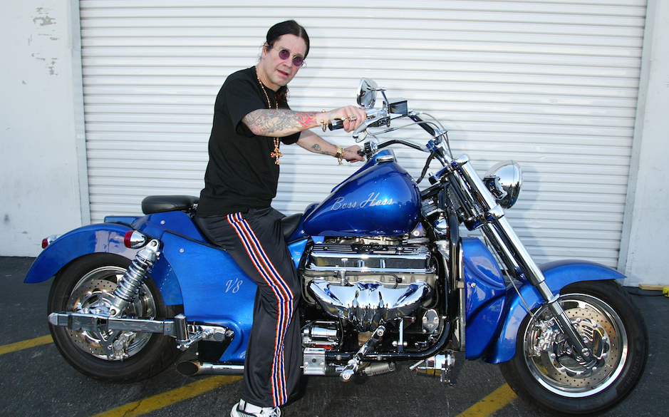 Ozzy Osbourne signs a 2003 Boss Hoss motorcycle for B.A.D.D. -Bikers Against Drunk Drivers to be given away in a raffle. More