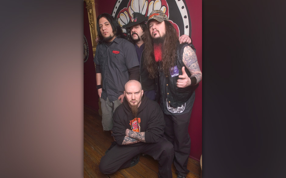 Group portrait of American music group Damageplan as the pose backstage at the House of Blues, Chicago, Illinois, April 8,...