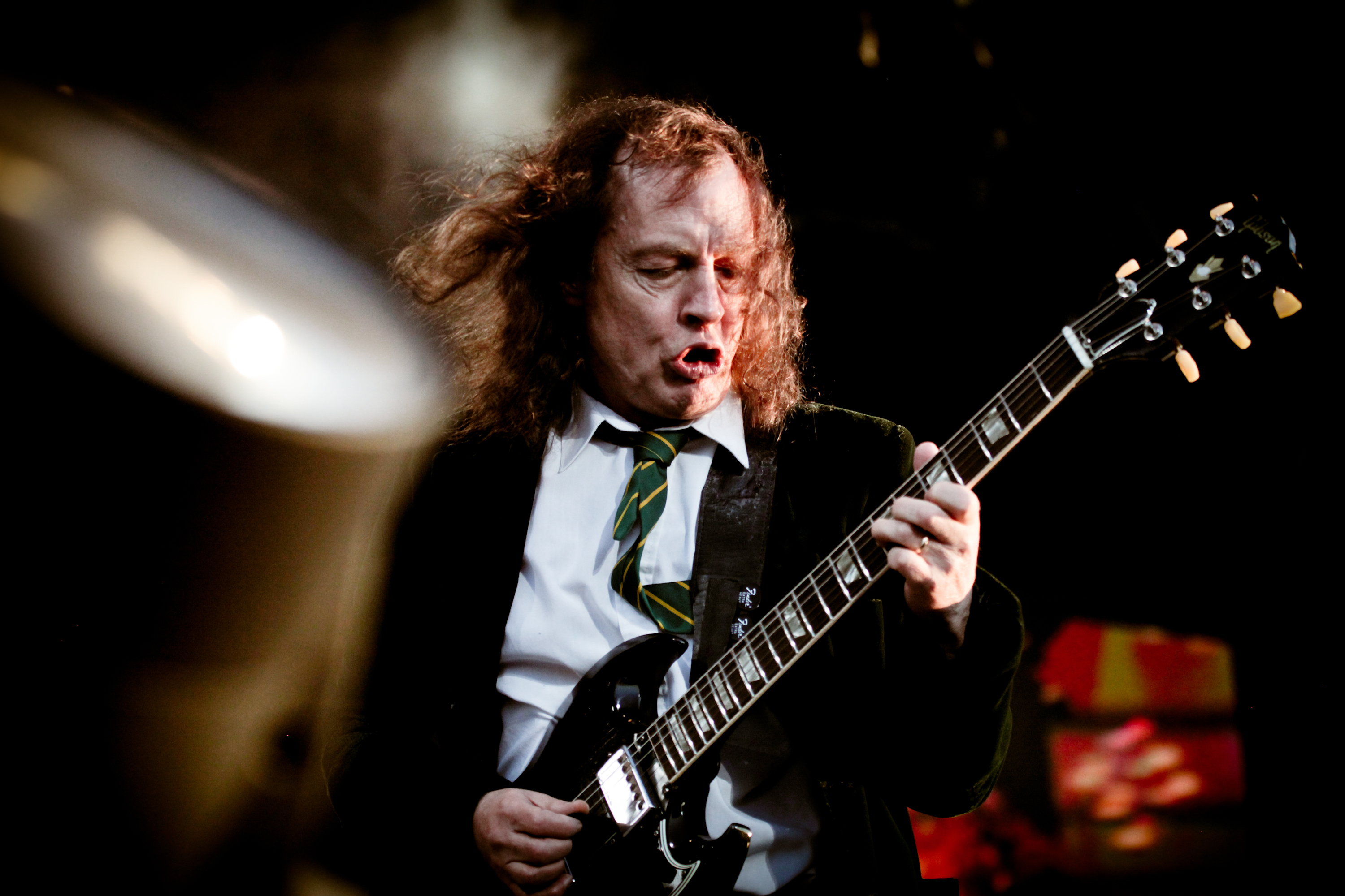 DONINGTON, UK - JUNE 11: Angus Young of AC/DC performs on stage at Download Festival on June 11, 2010 in Donington, UK. (Phot