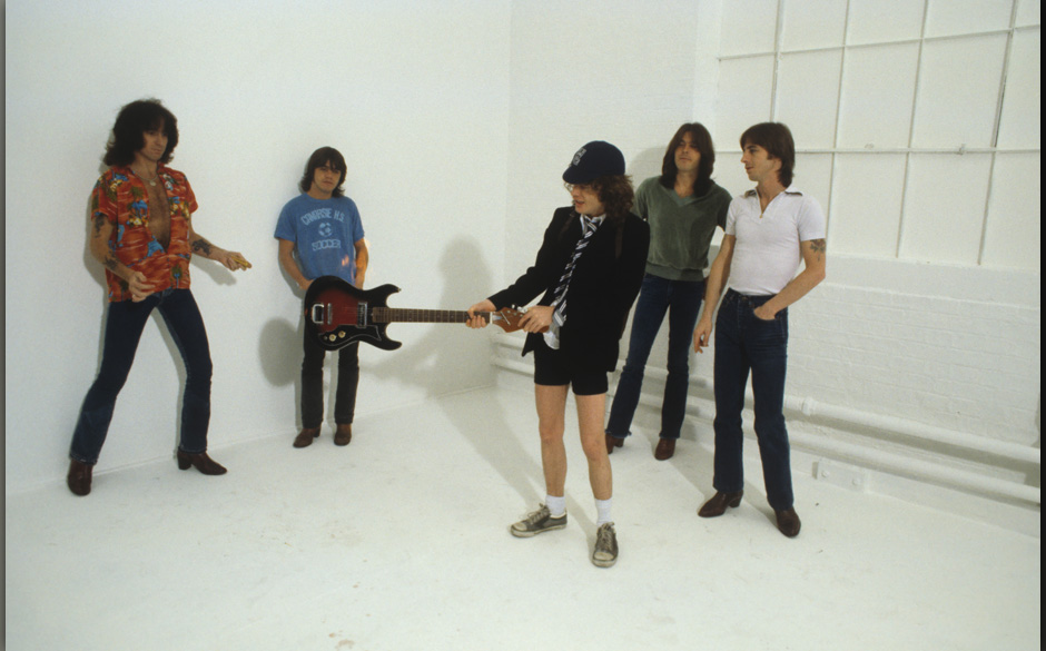 LONDON, UNITED KINGDOM - AUGUST 01: (left to right) Bon Scott, Malcolm Young, Angus Young, Cliff Williams and Phil Rudd of...