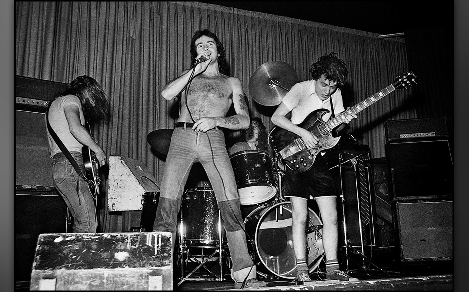 UNITED KINGDOM - MAY 24:  Photo of AC/DC; Malcolm Young, Bon Scott, Phil Rudd, Angus Young performing live onstage on first U