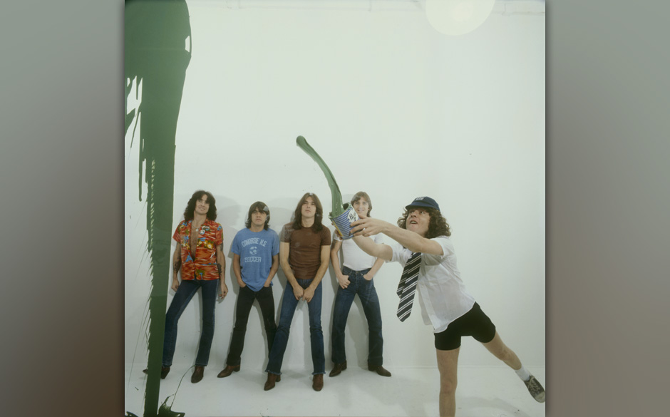 LONDON, UNITED KINGDOM - AUGUST 01: (left to right) Bon Scott, Malcolm Young, Cliff Williams, Phil Rudd and Angus Young of...
