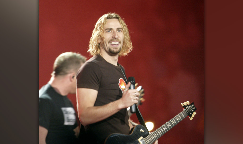 EDMONTON - APRIL 4:  Musician Chad Kroeger of Nickelback performs onstage at the 2004 Juno Awards at Rexall Place on April 4,