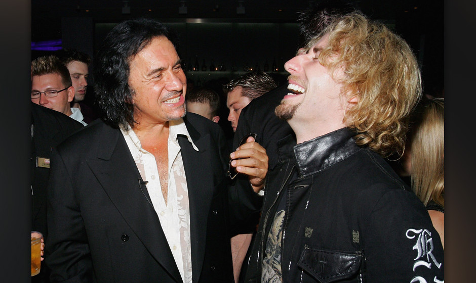 LAS VEGAS - AUGUST 25:  Nickelback frontman Chad Kroeger (R) shares a laugh with Kiss singer/bassist Gene Simmons during Simm