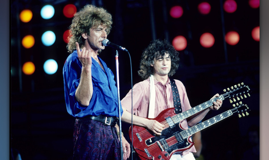 UNITED STATES - JULY 13:  Photo of Jimmy PAGE and LED ZEPPELIN and Robert PLANT and LIVE AID; L-R: Robert Plant, Jimmy Page p