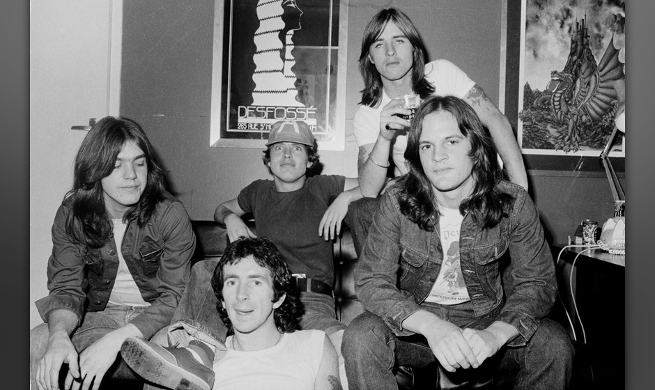 AC/DC group portrait, London, July 1976, L-R Malcolm Young, Bon Scott, Angus Young, Phil Rudd, Mark Evans. (Photo by Micha...