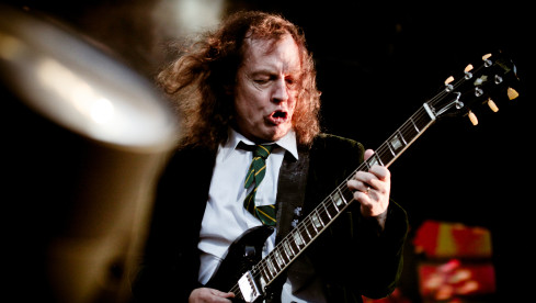 DONINGTON, UK - JUNE 11: Angus Young of AC/DC performs on stage at Download Festival on June 11, 2010 in Donington, UK. (P...