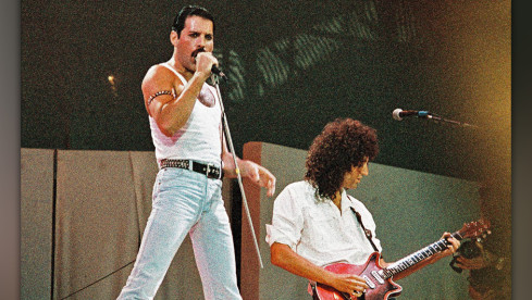 LONDON, UNITED KINGDOM - JULY 13: Freddie Mercury of Queen performs on stage at Live Aid on July 13th, 1985 in Wembley Sta...