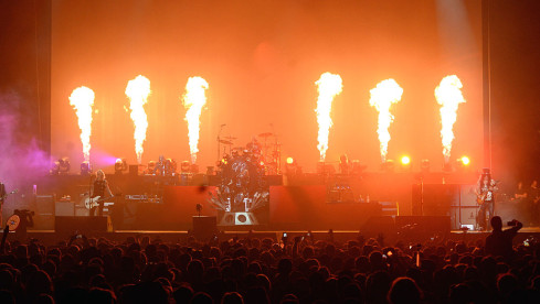 INDIO, CA - APRIL 16:  Musicians Axl Rose (L) and Slash of Guns N' Roses perform onstage during day 2 of the 2016 Coachell...
