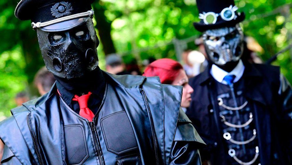 Dressed up people attend a so-called 'Victorian Picnic' during the Wave-Gotik-Treffen (WGT) festival in Leipzig, eastern Germ