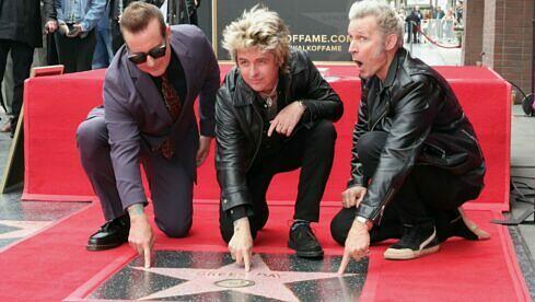 Tré Cool, Billie Joe Armstrong und Mike Dirnt von Green Day an ihrem Stern auf dem Hollywood Walk Of Fame (01.05.2025)